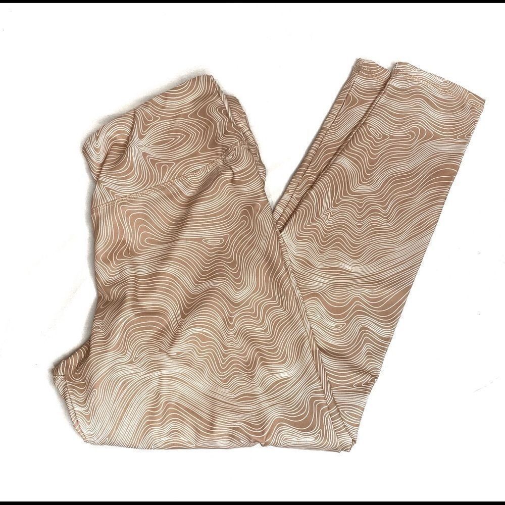 BCBGMAXAZRIA dusty rose/ tan swirl performance leggings size L